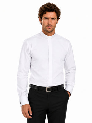 Man wearing a white clerical shirt and black pants on a white background