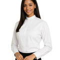Woman wearing a white shirt with a tab collar on a white background