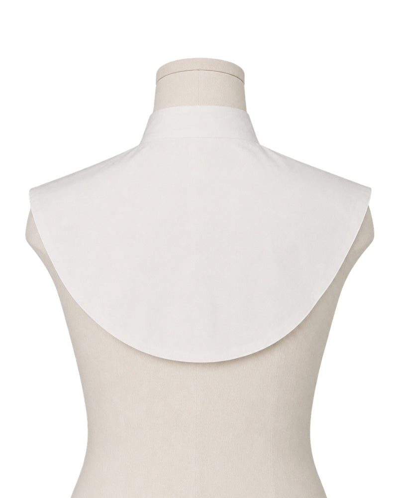 A white Amice displayed on a beige mannequin torso against a white background.