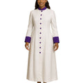 A woman modeling a long white prayer robe with purple trim at the collar, cuffs, and a matching purple button-down front, shown against a plain white background.
