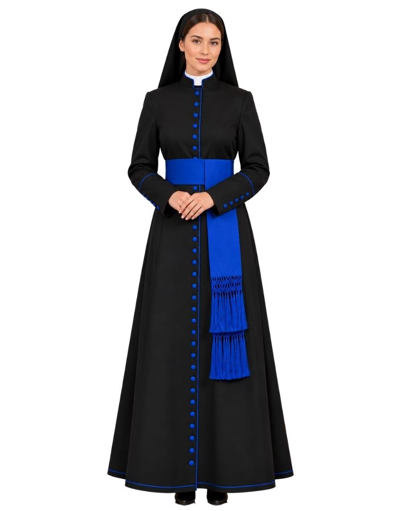A woman modeling a long Cassock Black With Royal Blue Trim waist sash and matching blue button accents, photographed against a plain white background.