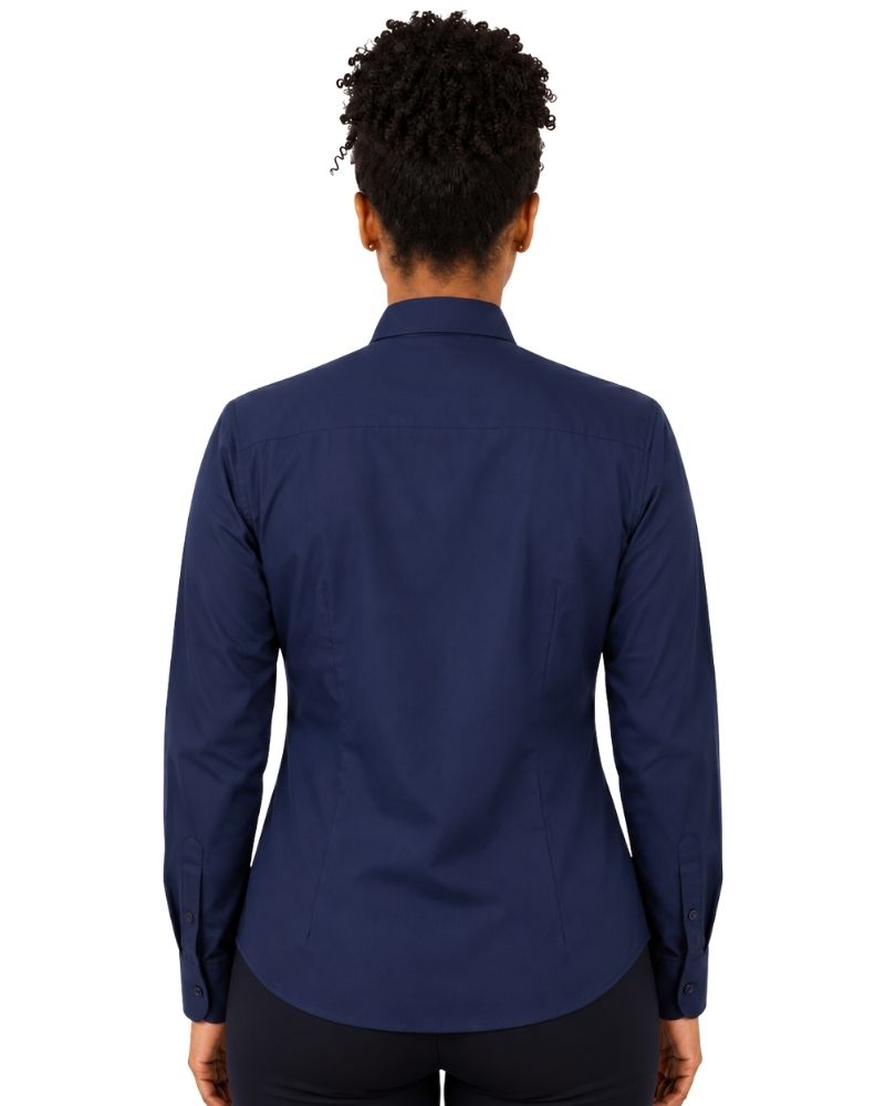 A woman viewed from the back wearing a navy blue long-sleeve clerical shirt, set against a plain white background.