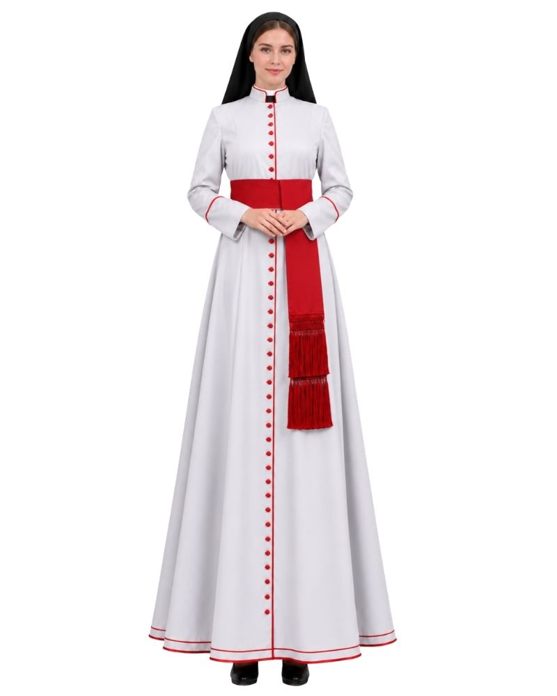 A woman modeling a Sanctified White Cassock with a wide red waist sash, red decorative buttons down the front, red piping details, and a red tassel accent, set against a plain white background.