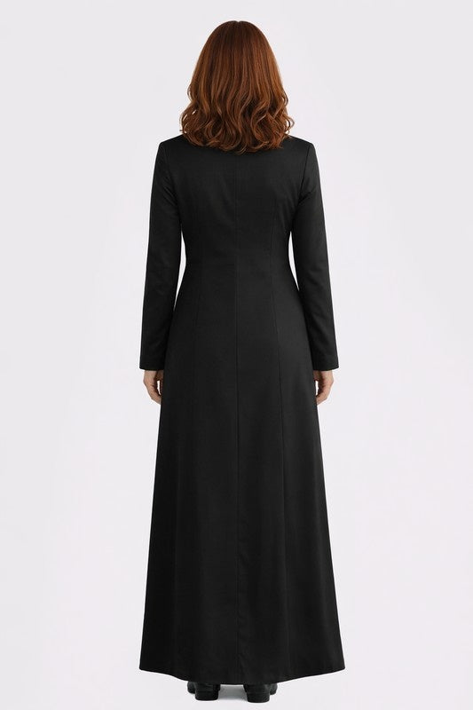 Woman wearing a black long dress on a white background