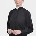 Women wearing a black clerical collar outfit on a white background
