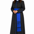 Woman wearing a black robe with blue accents on a white background