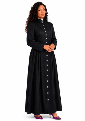 Woman wearing a long black robe with buttons on a white background