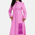 Woman wearing a pink robe with a white background