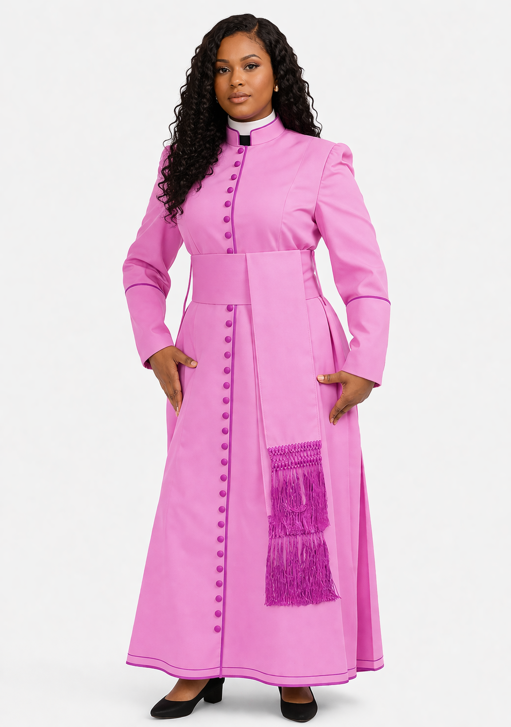 Woman wearing a pink robe with a white background