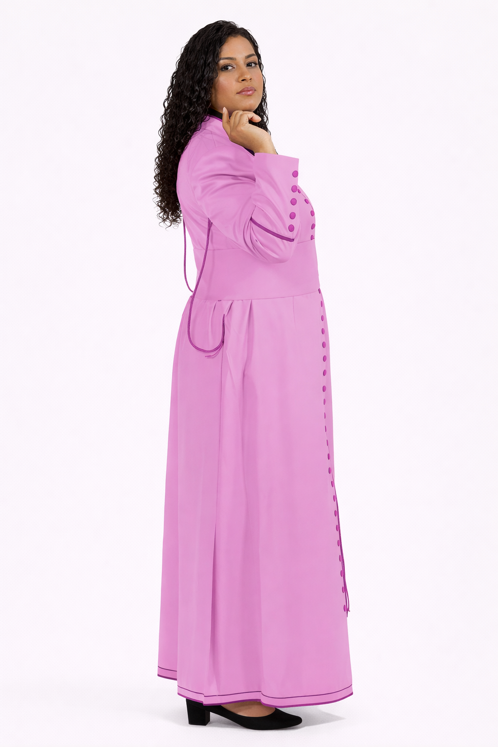 Woman wearing a pink long robe on a white background
