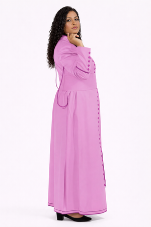 Woman wearing a pink long robe on a white background