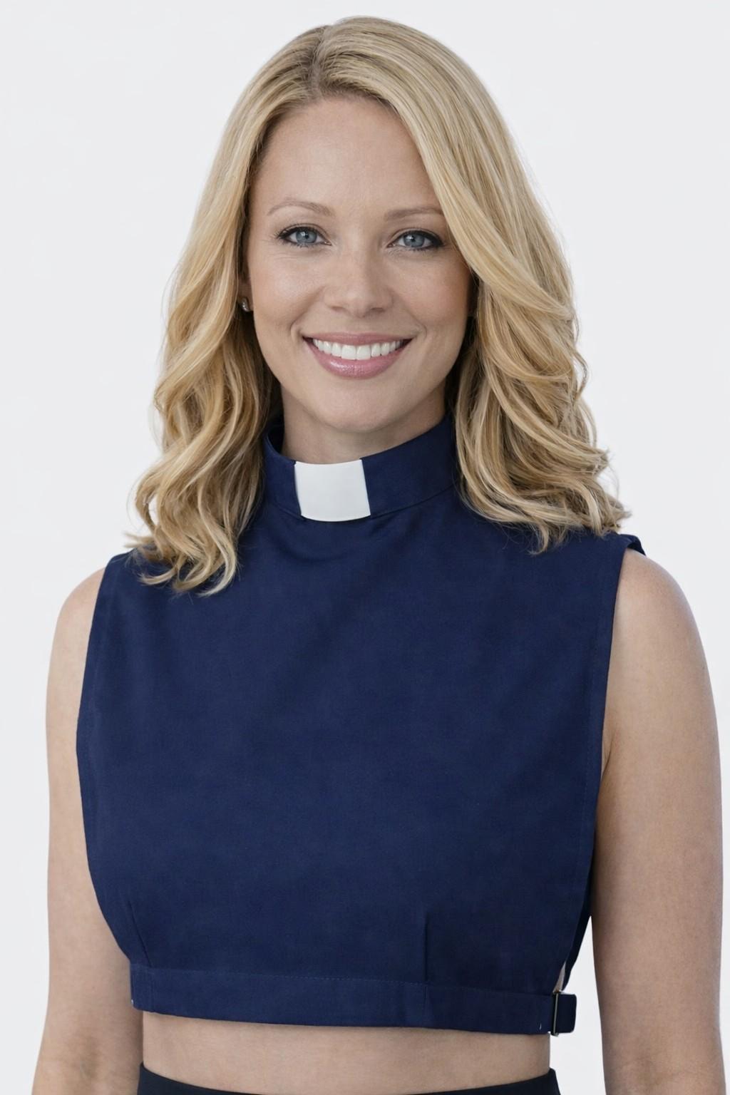 Woman wearing a navy blue sleeveless top with a white collar against a white background