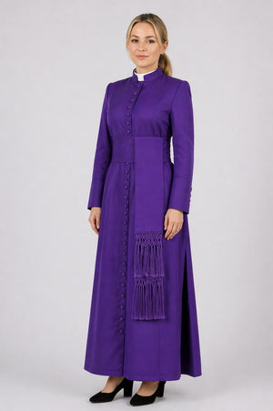 Woman wearing a long purple dress with a white collar on a white background