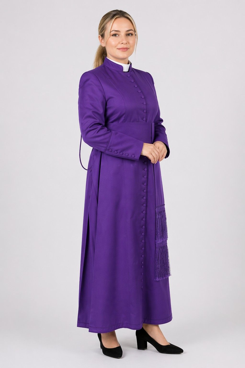 Woman wearing a purple robe on a white background