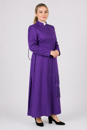 Woman wearing a purple robe on a white background