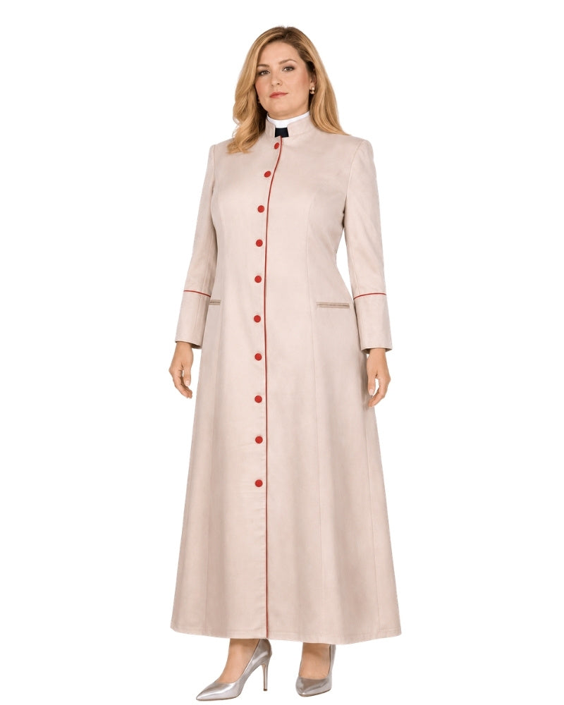 A woman modeling a long, light beige or cream-colored cassock with a high stand collar, red button front, and red piping details on the cuffs and front opening, paired with silver heels against a plain white background.