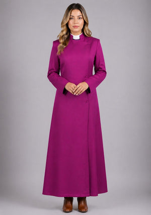Woman wearing a long purple dress with a white collar against a gray background