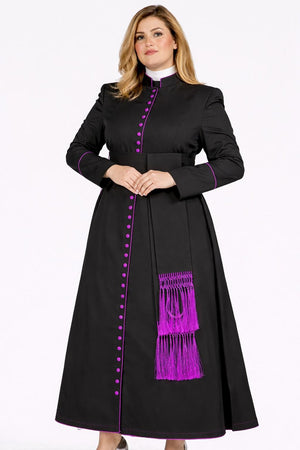 Woman wearing a black robe with purple accents on a white background