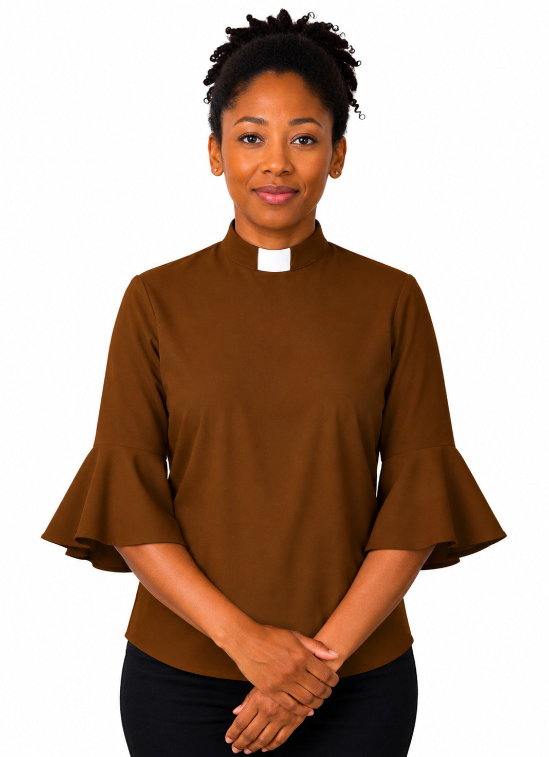 Woman wearing a brown shirt with ruffled sleeves on a white background