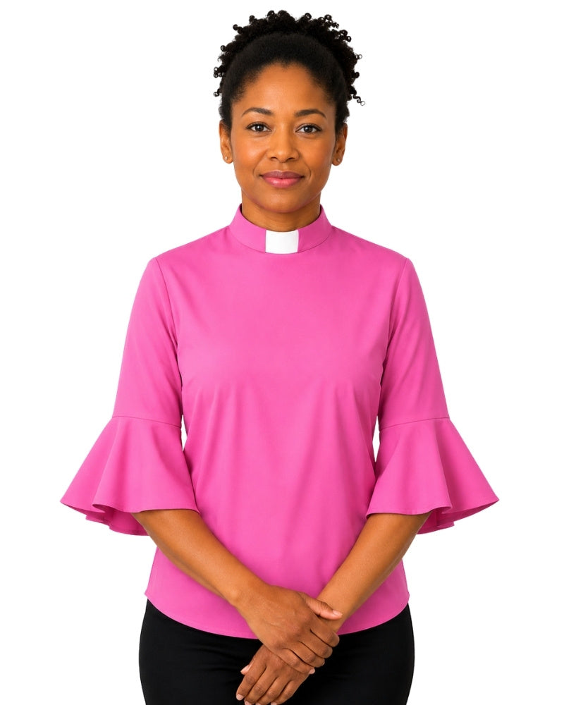 Woman wearing a pink clergy shirt with a white collar on a white background.
