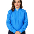 women wearing a blue shirt with a white collar on a plain background