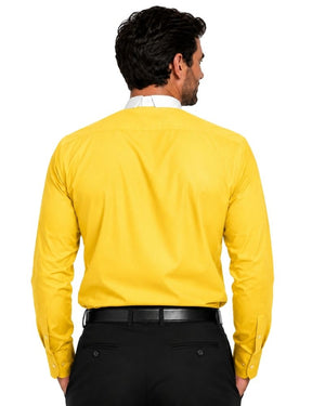 A man viewed from the back wearing a bright yellow long-sleeve clerical shirt tucked into black trousers with a black belt, against a plain white background.