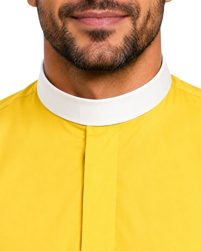 Close-up of a man wearing a bright yellow clerical shirt with a contrasting white high collar, shown against a plain white background.