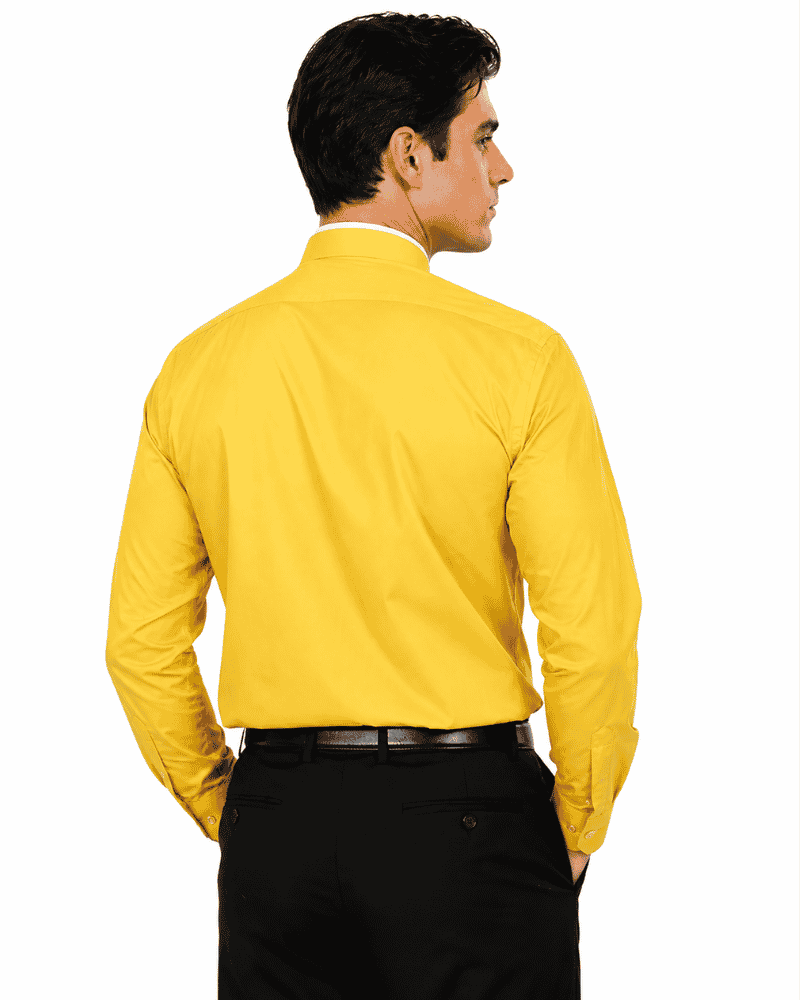 A man shown from the back wearing a bright yellow long-sleeve clerical shirt tucked into black trousers, against a plain white background.