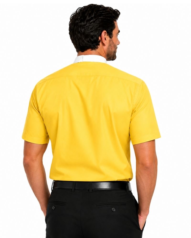 A man wearing a bright yellow short-sleeve clerical shirt with a white collar, paired with black trousers and a black belt, shown in profile against a white background.