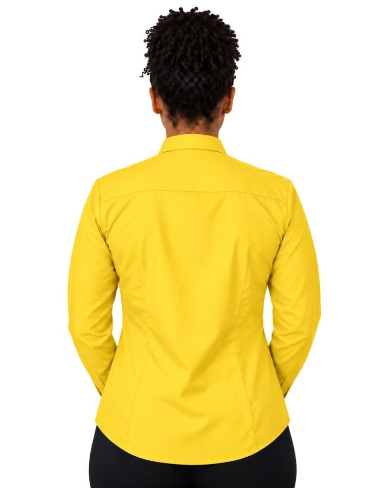 A person viewed from the back wearing a bright yellow long-sleeve collared clerical shirt and black bottoms, against a plain white background.